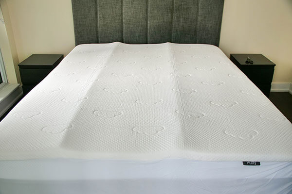 The Puffy mattress topper on the mattress